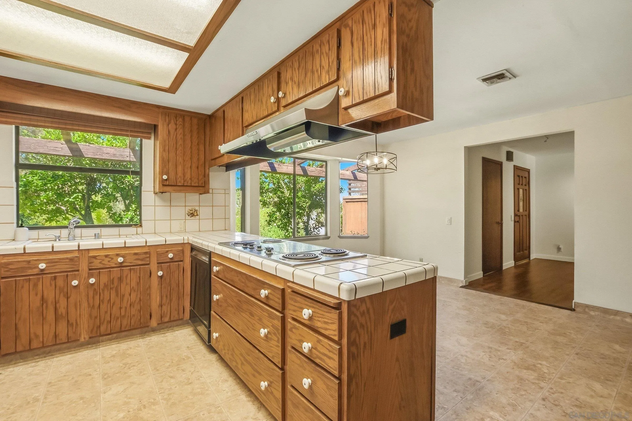 9907 Anderson Ranch Road Descanso, CA 91916 - Photo 14 of 42 a kitchen that has a sink and a stove