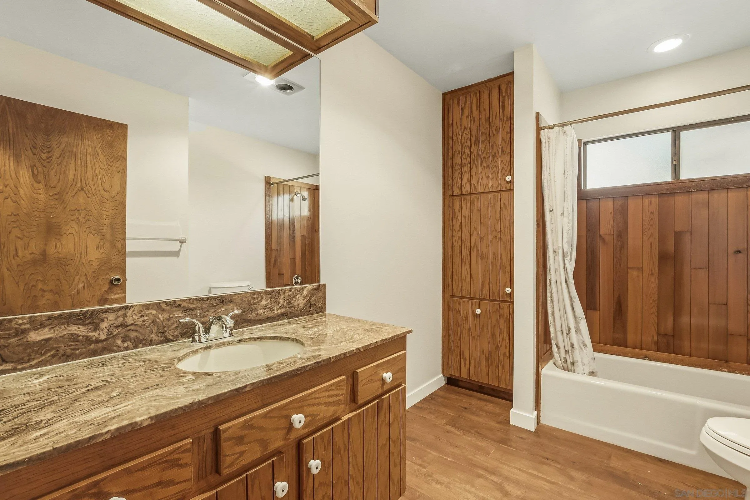 9907 Anderson Ranch Road Descanso, CA 91916 - Photo 20 of 42 a bathroom with a granite countertop sink toilet and shower