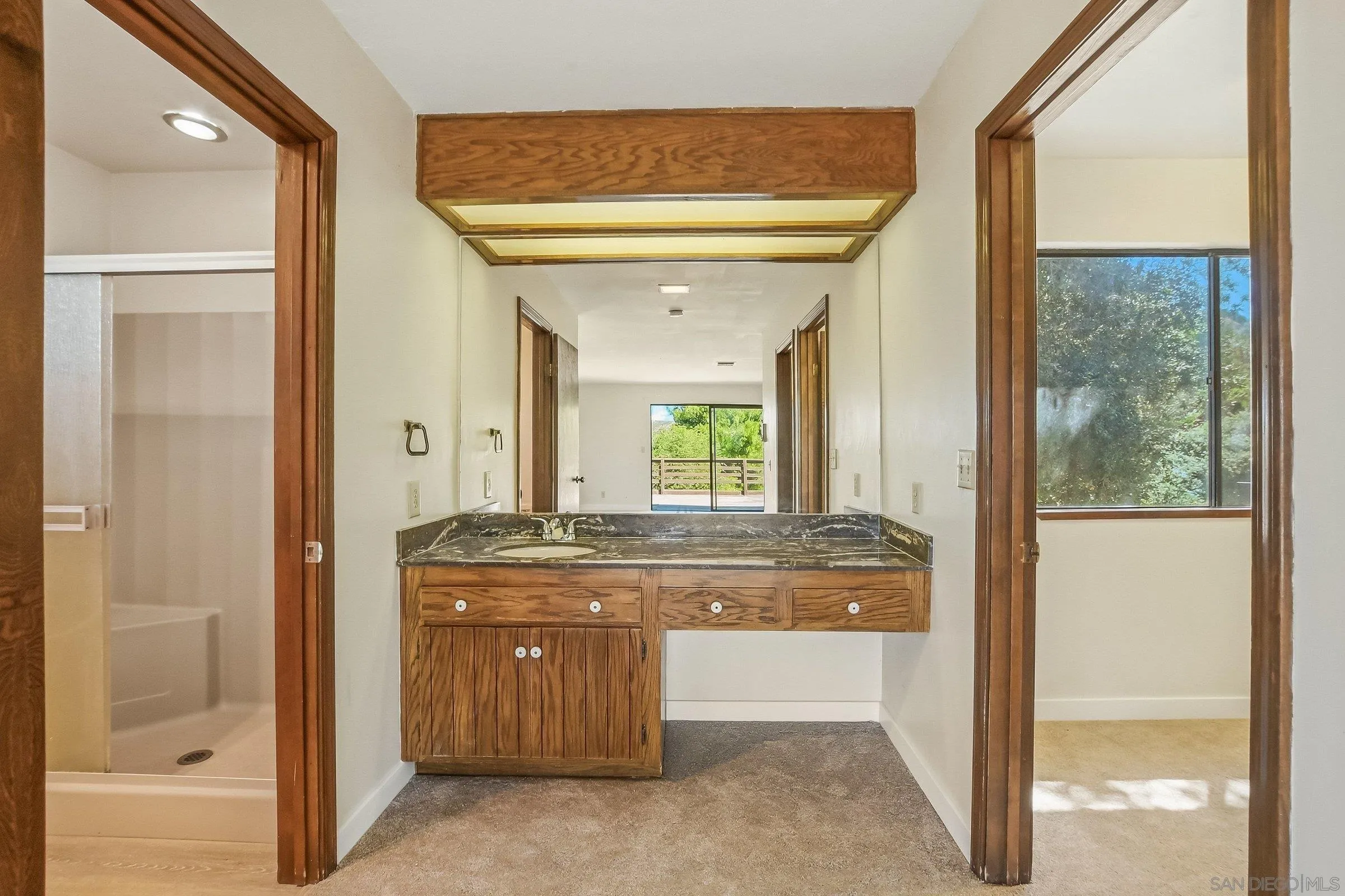 9907 Anderson Ranch Road Descanso, CA 91916 - Photo 24 of 42 a view of living room with granite countertop furniture and a fireplace