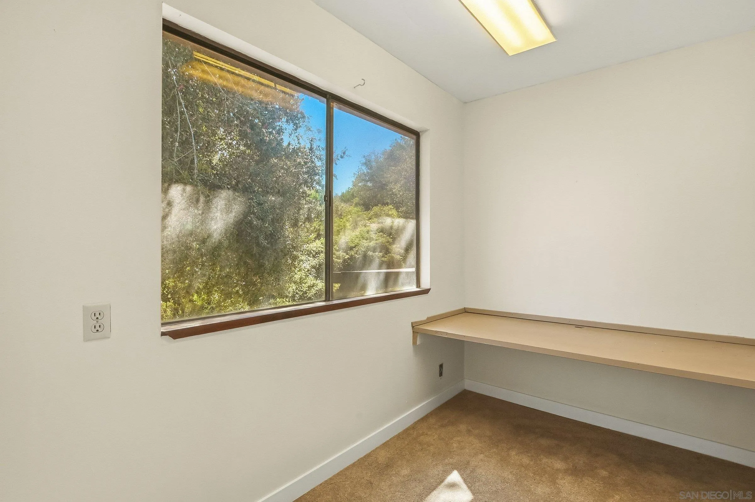9907 Anderson Ranch Road Descanso, CA 91916 - Photo 27 of 42 a view of room with window and a hallway