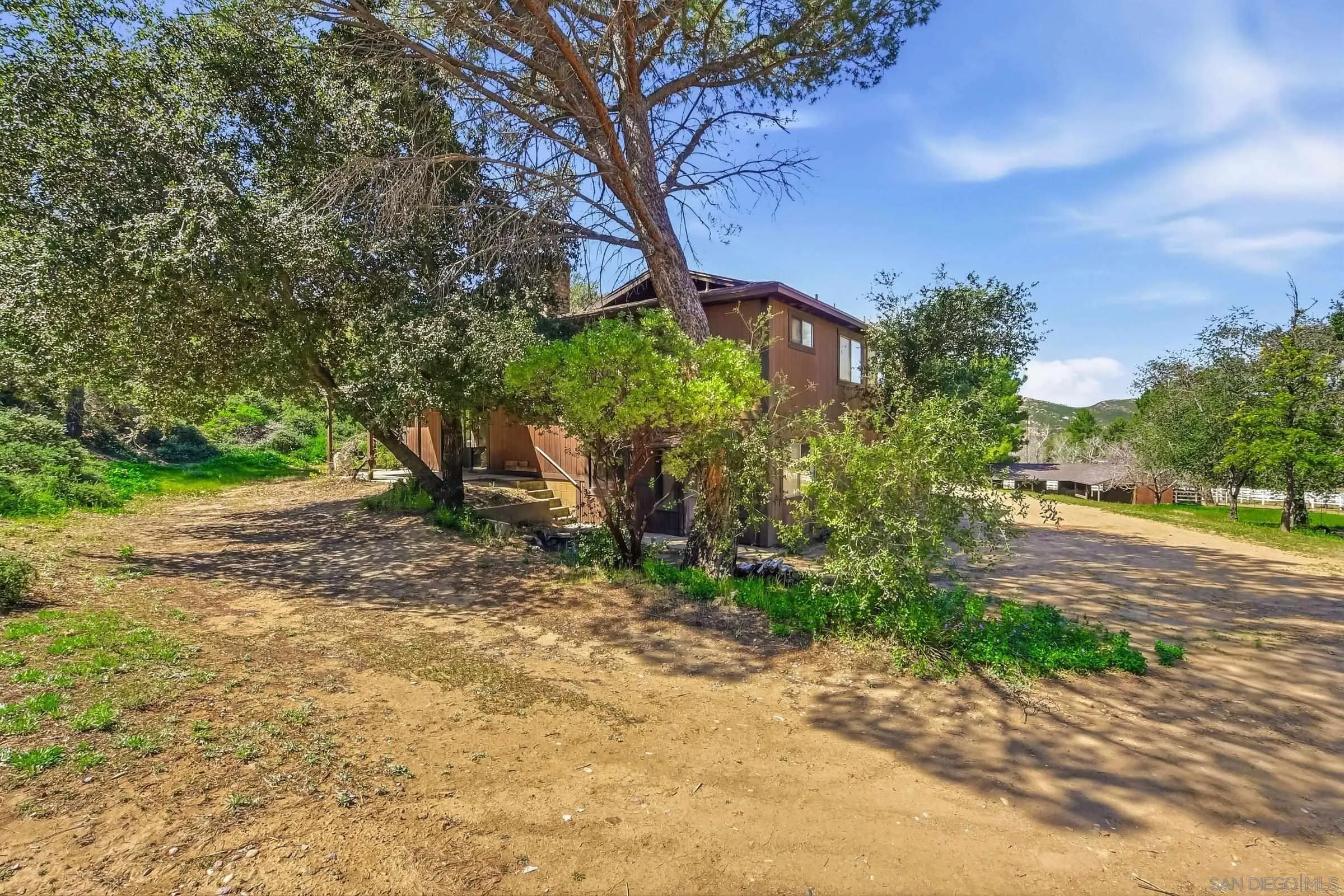 9907 Anderson Ranch Road Descanso, CA 91916 - Photo 30 of 42 a view of a yard with plants and trees