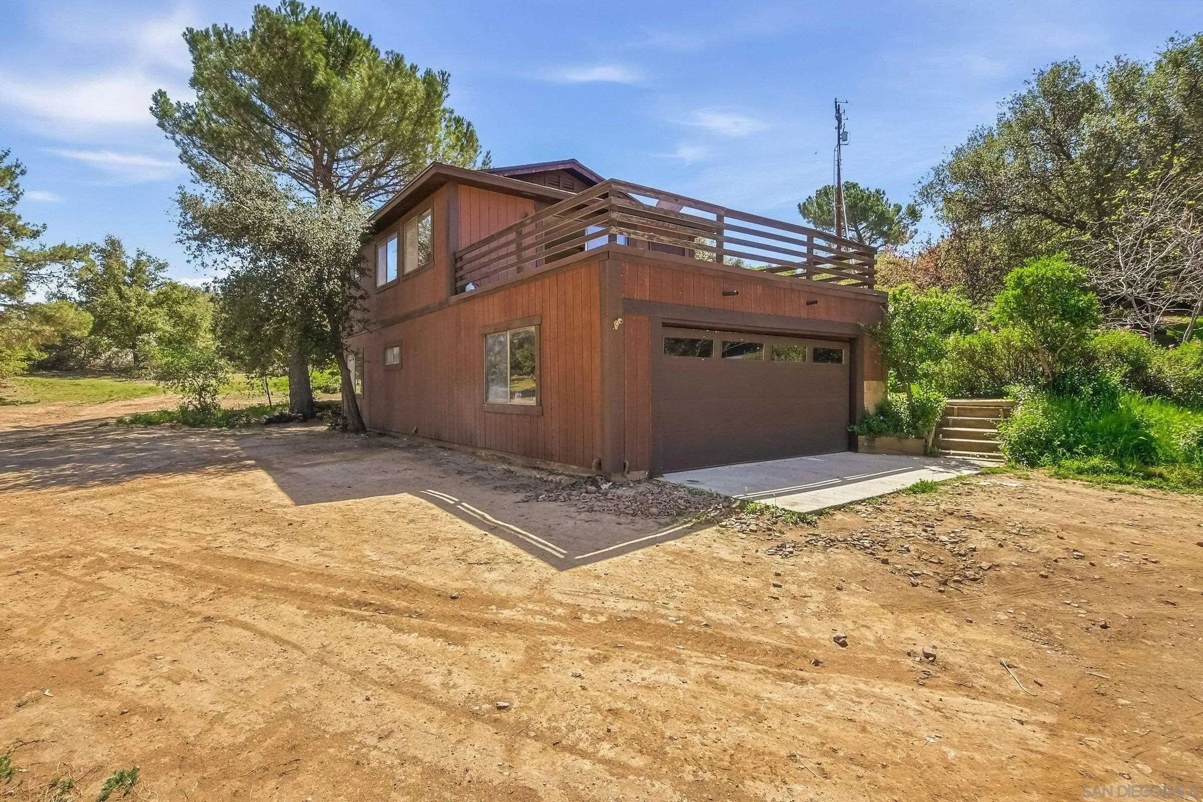 9907 Anderson Ranch Road Descanso, CA 91916 - Photo 4 of 42 a view of a house with a snow on the road