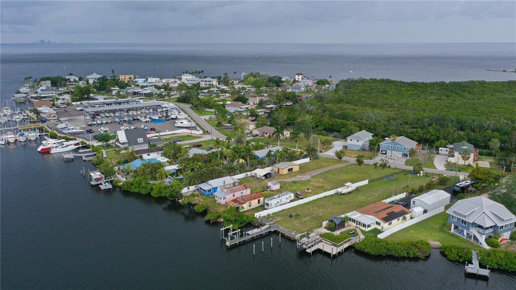 3306 West Shell Point Road Ruskin, FL 33570 - Photo 8 of 10 an aerial view of a house having yard