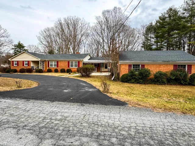 a view of a house with swimming pool