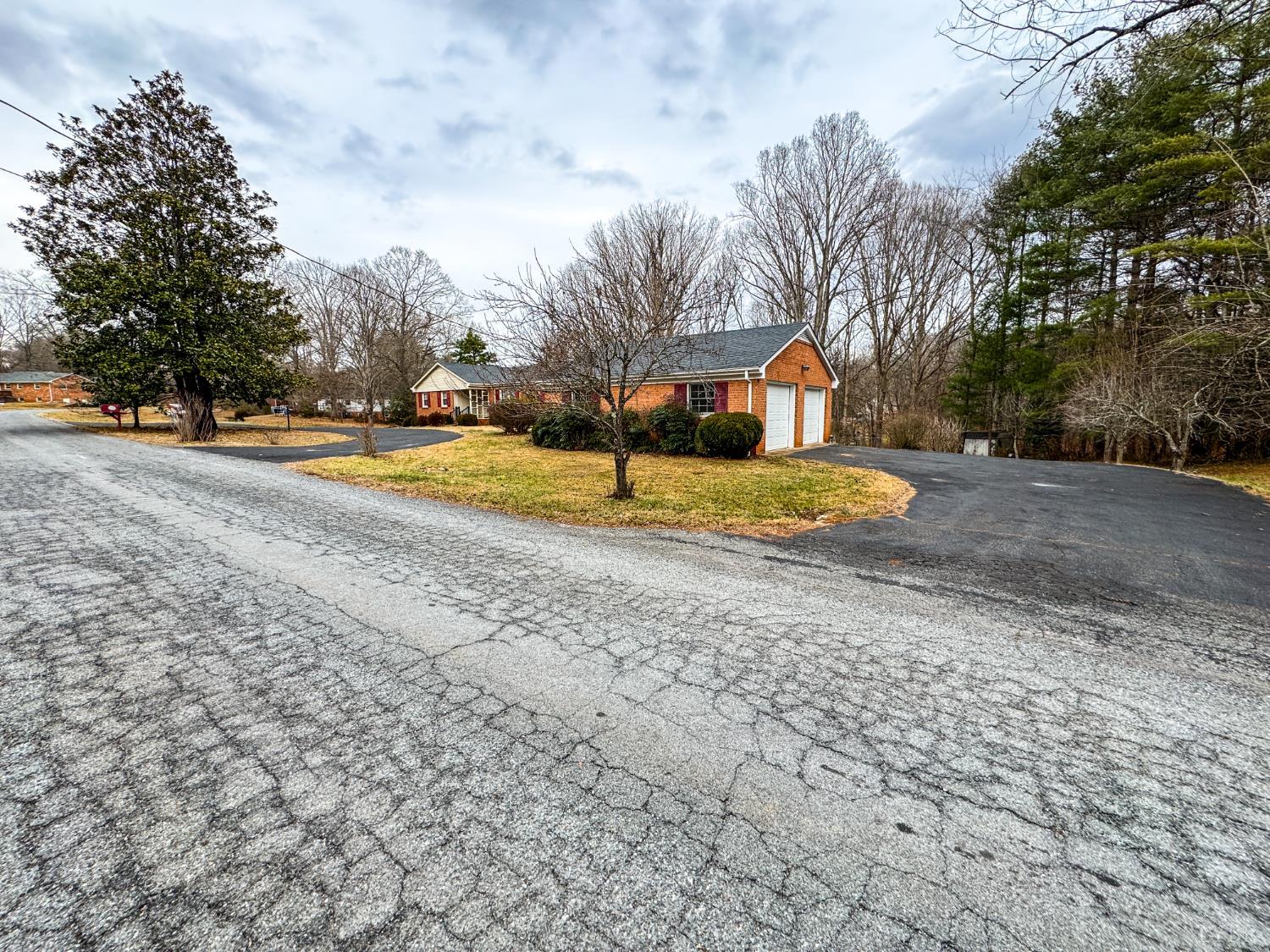 88 Jean Place Evington, VA 24550 - Photo 46 of 46 a house with trees in front of it