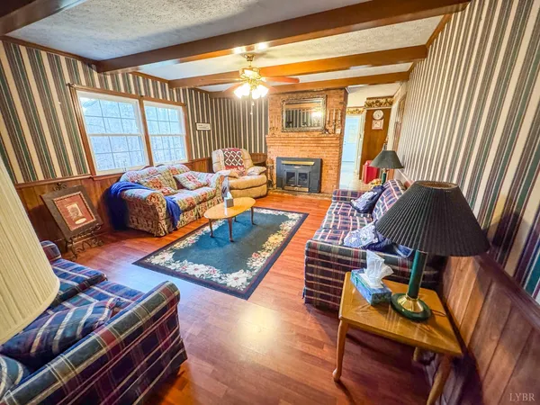 a bedroom with bed and a mirror