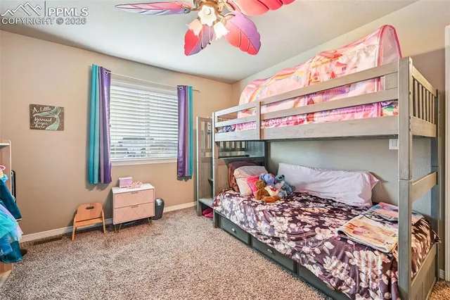 a bed room with a bed and a couch