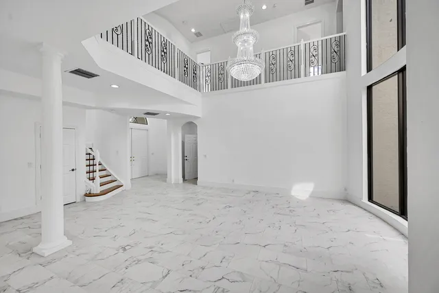 a bathroom with a sink toilet and mirror