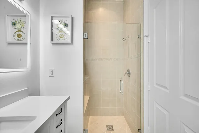 a view of a glass door and the balcony