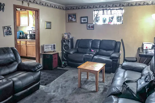 a living room with furniture and a couch
