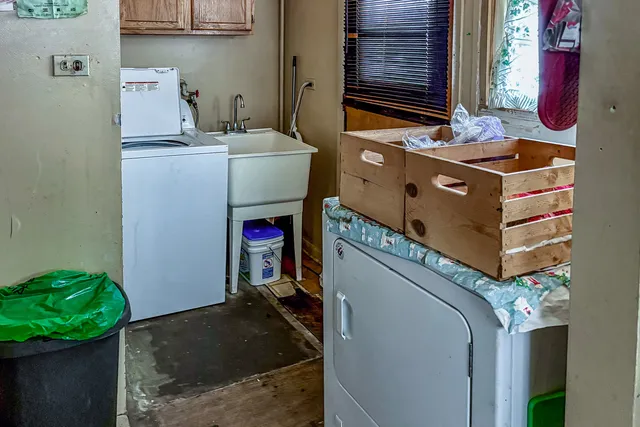 a storage room with washer and dryer