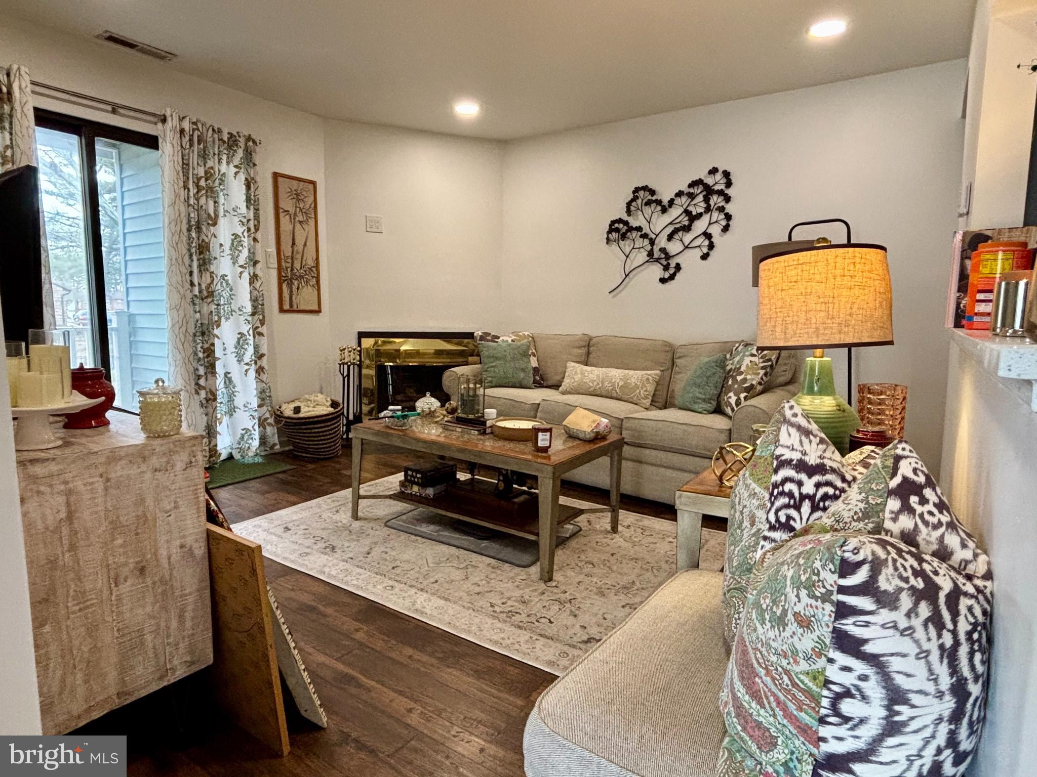 101 Gregorys Way Voorhees, NJ 08043 - Photo 2 of 16 a living room with furniture and a lamp