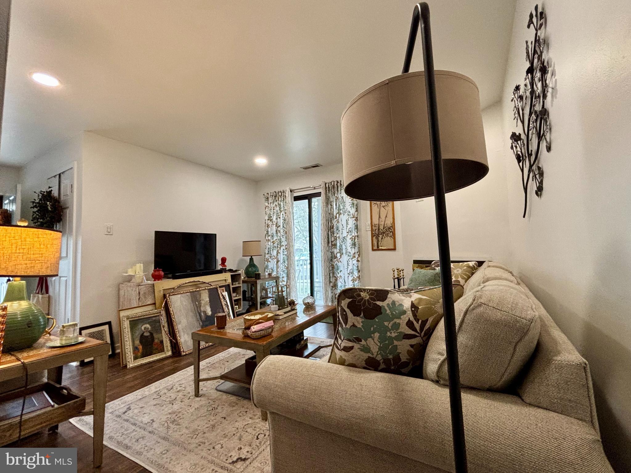 101 Gregorys Way Voorhees, NJ 08043 - Photo 4 of 16 a living room with furniture and a flat screen tv