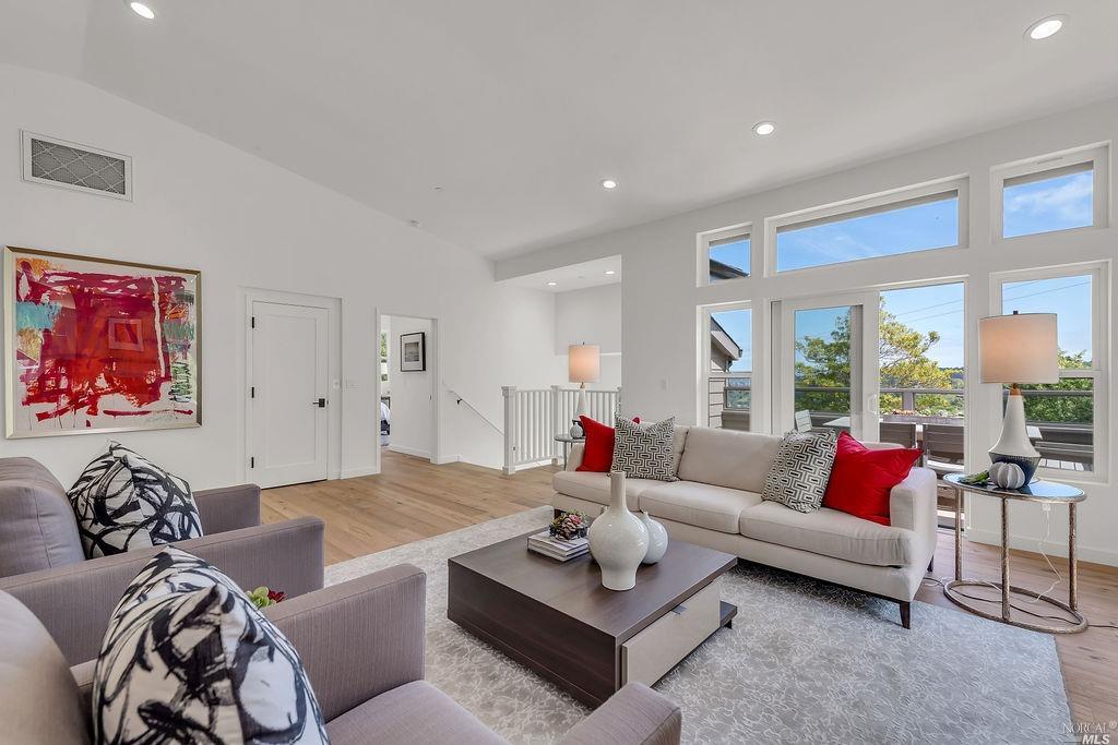 760 Bay Road Mill Valley, CA 94941 - Photo 1 of 1 a living room with furniture and a large window