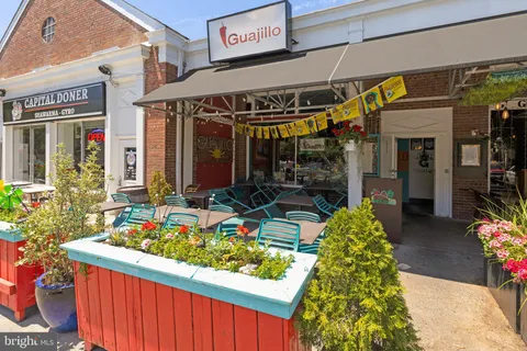 a view of a chairs and table in the patio