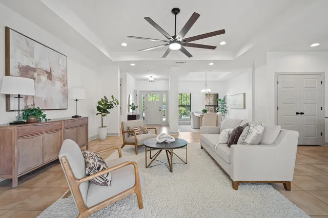 a kitchen with a sink a counter space appliances and cabinets