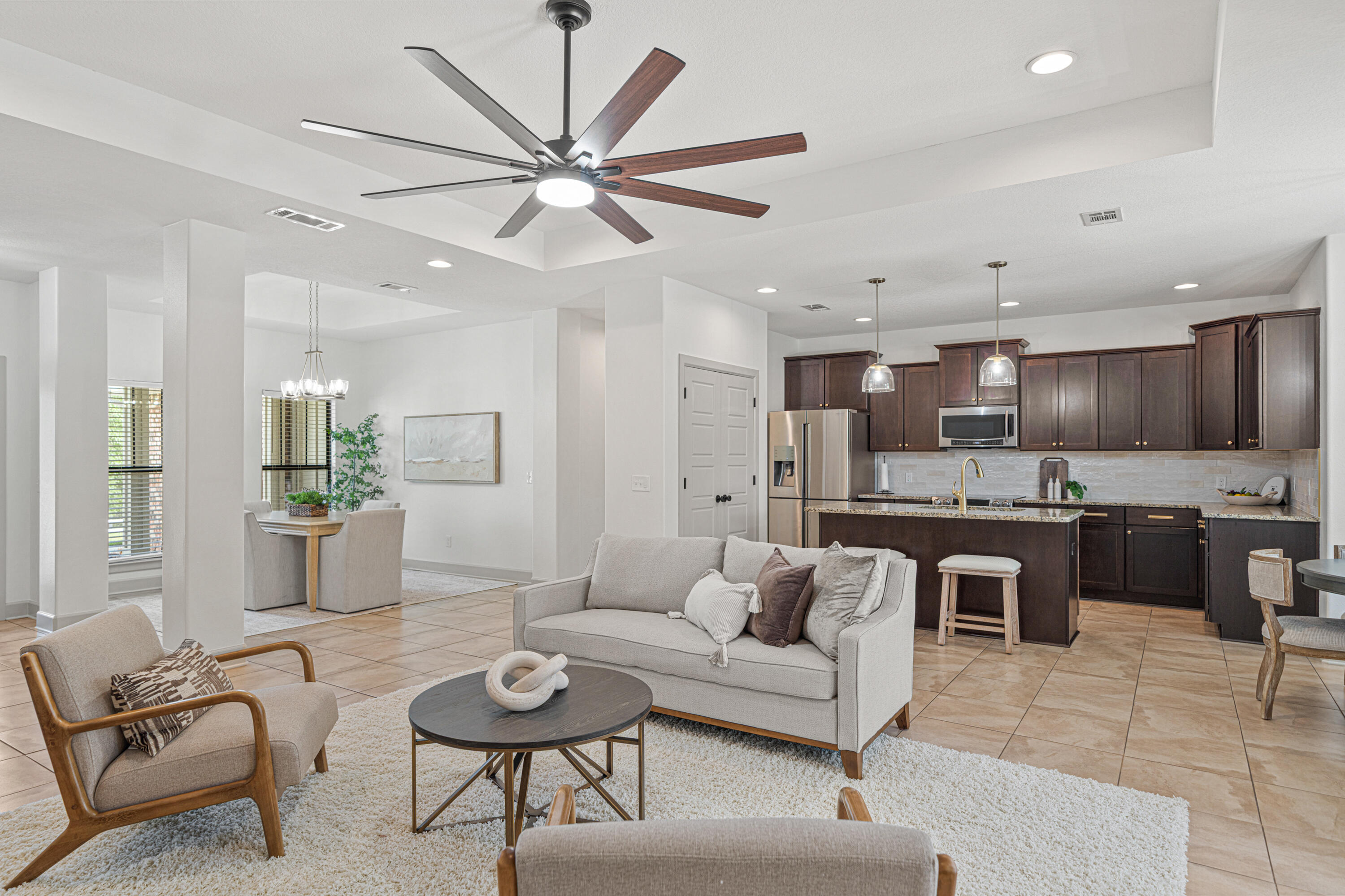 6301 Antigone Circle Crestview, FL 32536 - Photo 15 of 82 a living room with furniture and a view of kitchen