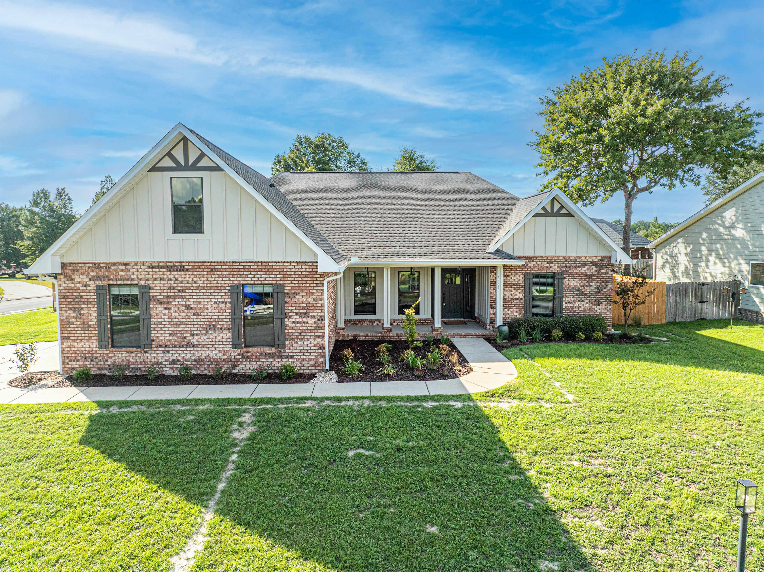 6301 Antigone Circle Crestview, FL 32536 - Photo 2 of 82 a front view of house with yard and green space
