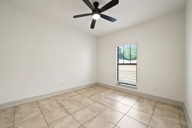 a view of a swimming pool with a yard