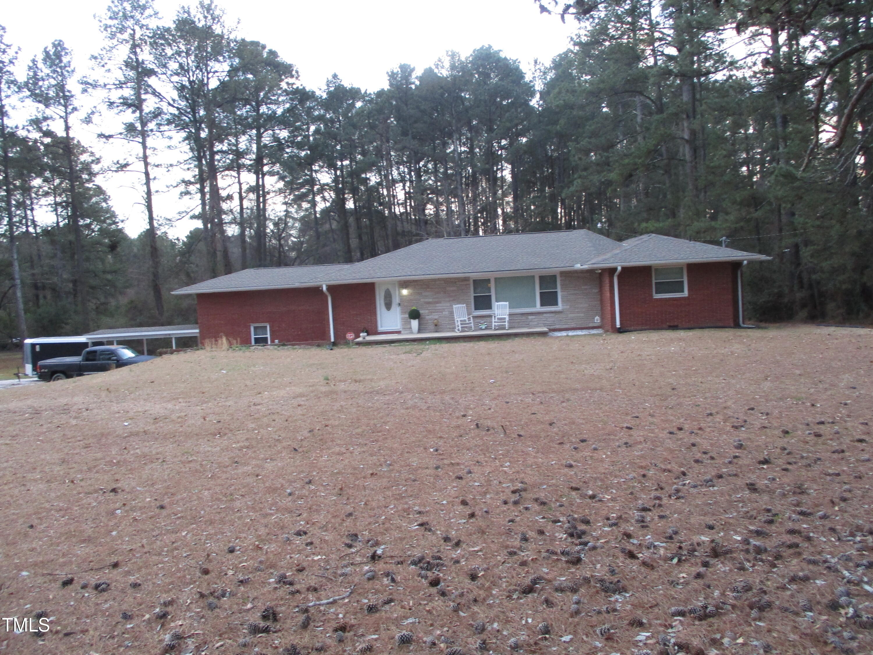 2506 Poole Road Raleigh, NC 27610 - Photo 1 of 6 front view of a house with a yard