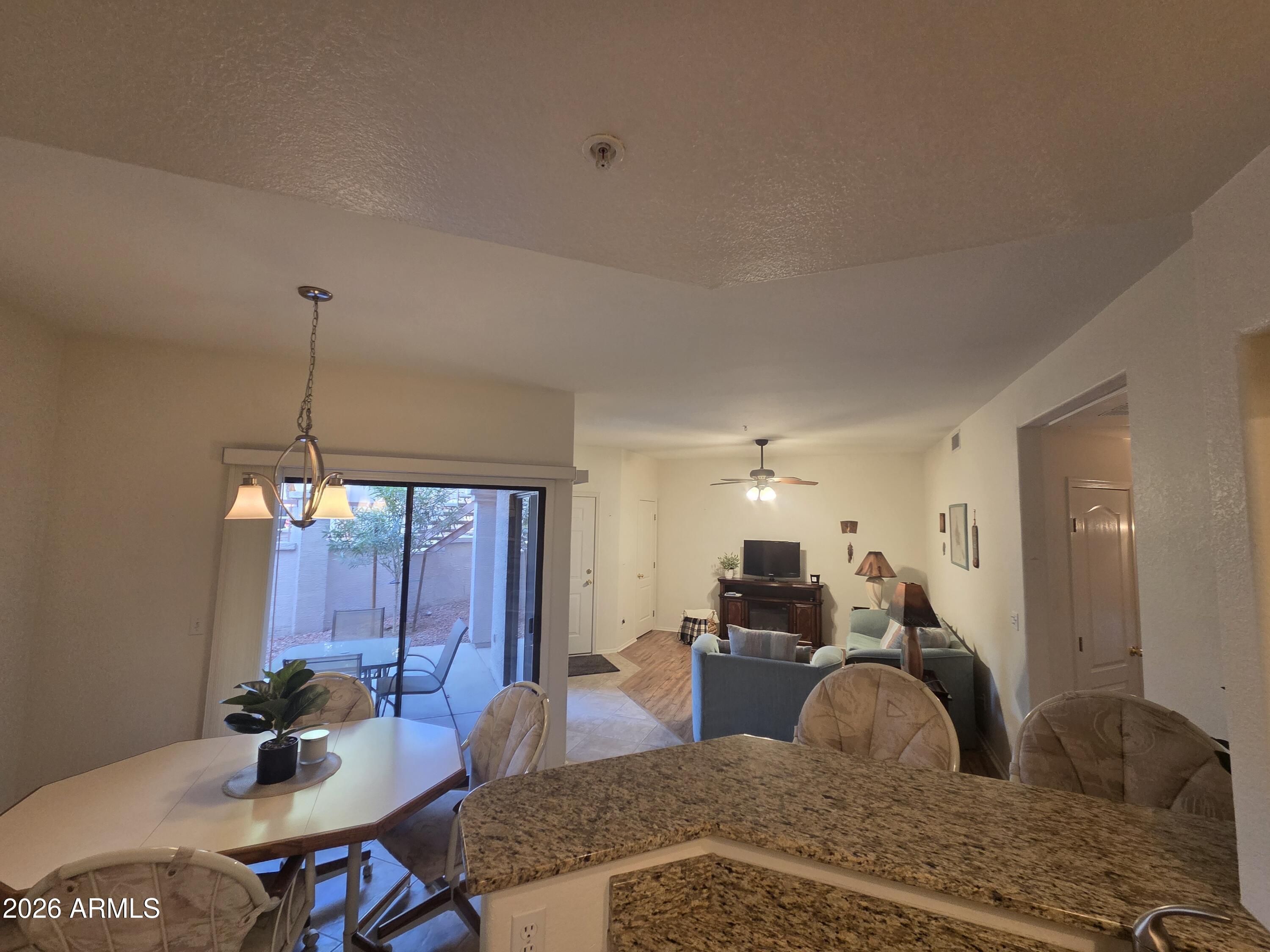 9151 West Greenway Road, Unit 182 Peoria, AZ 85381 - Photo 1 of 22 Open concept kitchen, dining, living
