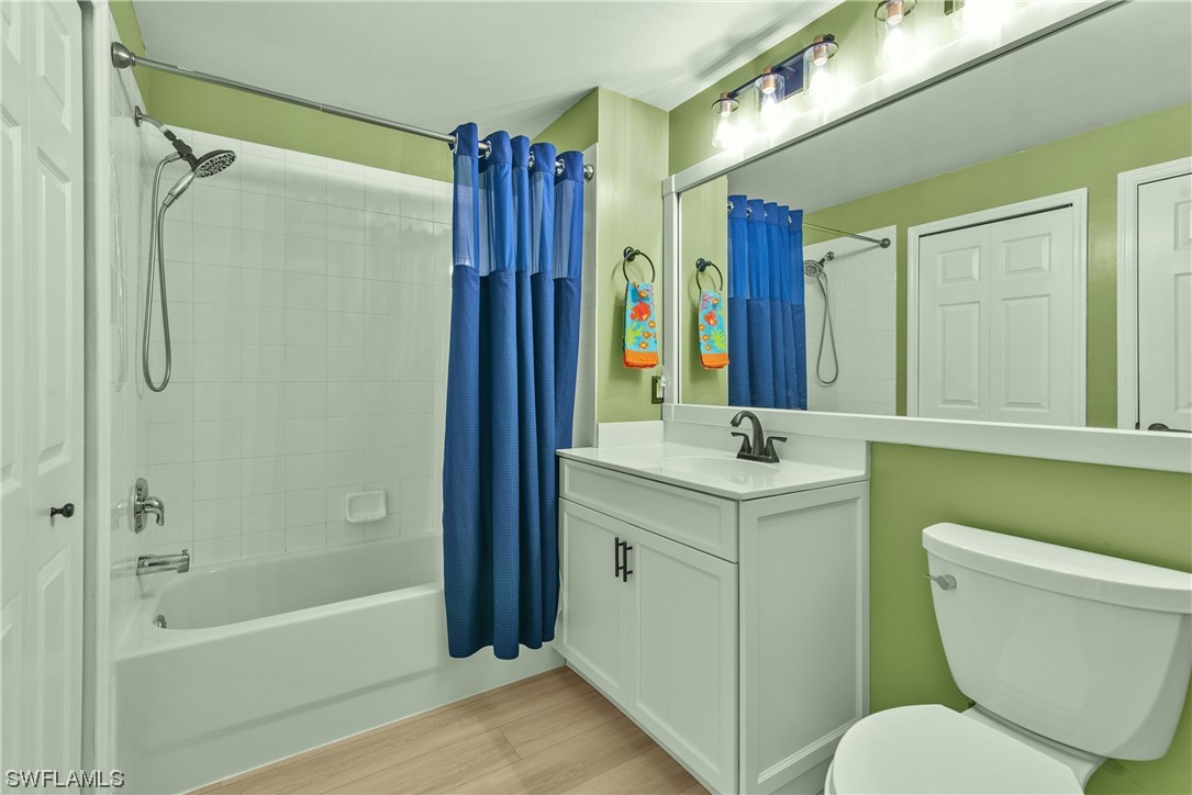 9575 Hemingway Lane, Unit 4410 Fort Myers, FL 33913 - Photo 11 of 23 a bathroom with a sink a toilet and a bathtub