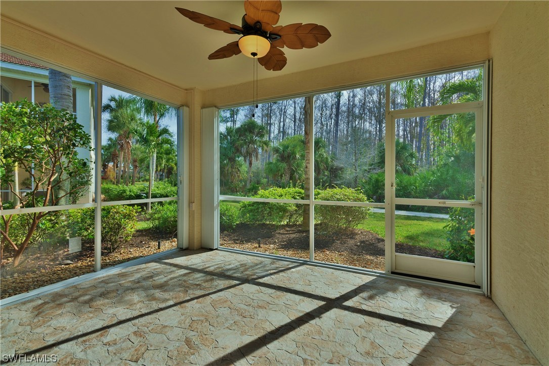 9575 Hemingway Lane, Unit 4410 Fort Myers, FL 33913 - Photo 6 of 23 a bedroom with balcony and furniture