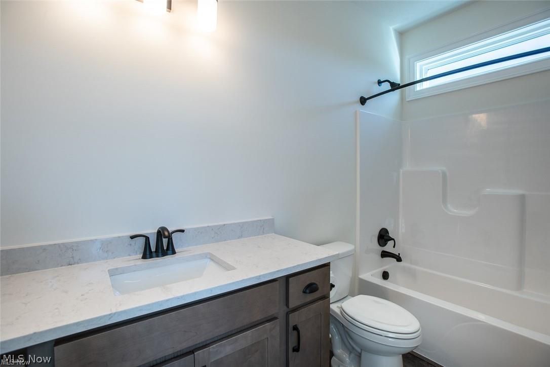 34286 Brookside Lane North Ridgeville, OH 44039 - Photo 30 of 50 Bathroom featuring vanity and bathtub / shower combination