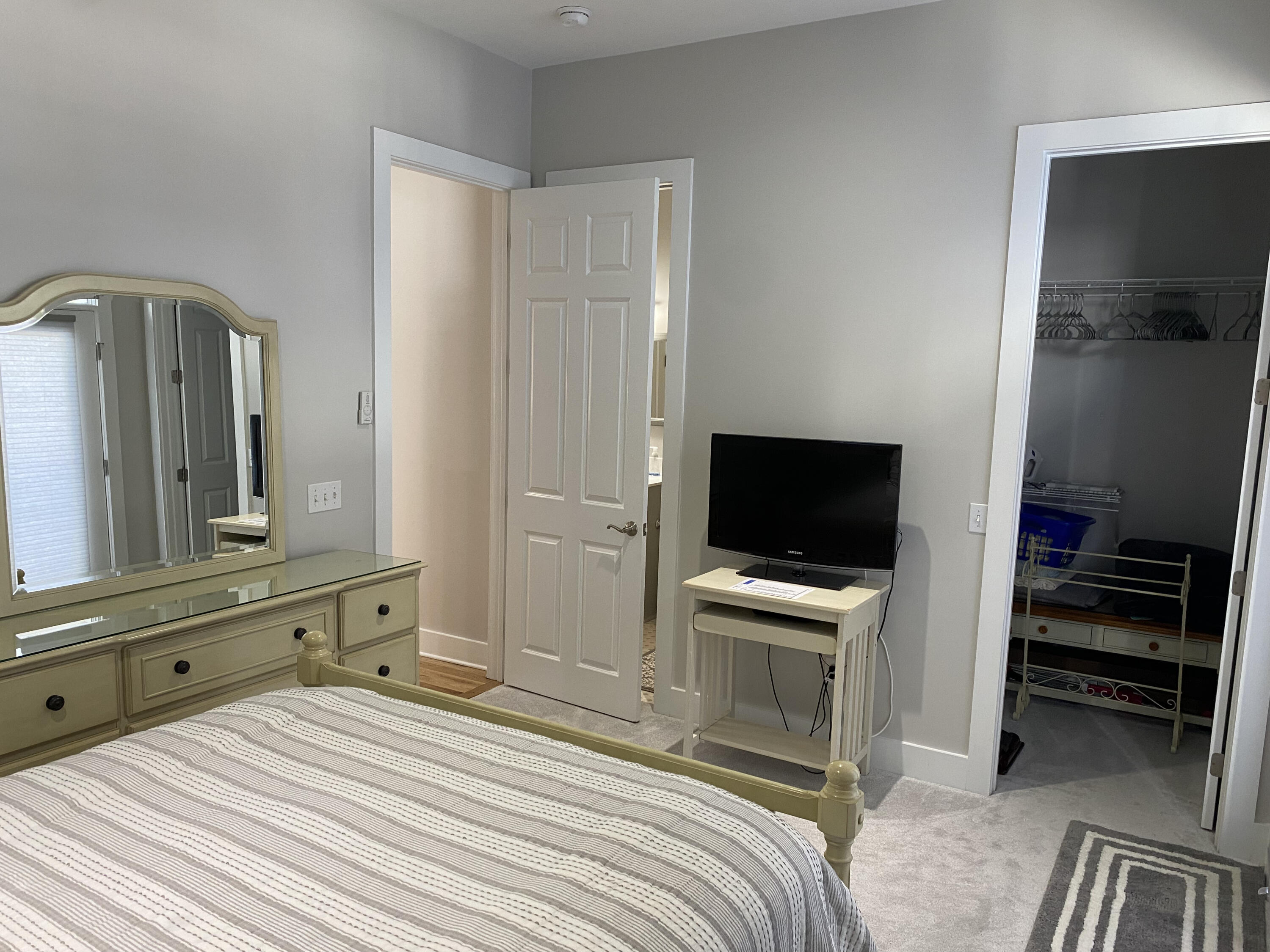 9 East Blue Crab Loop Inlet Beach, FL 32461 - Photo 12 of 55 a bedroom with a bed and a flat tv screen on wall