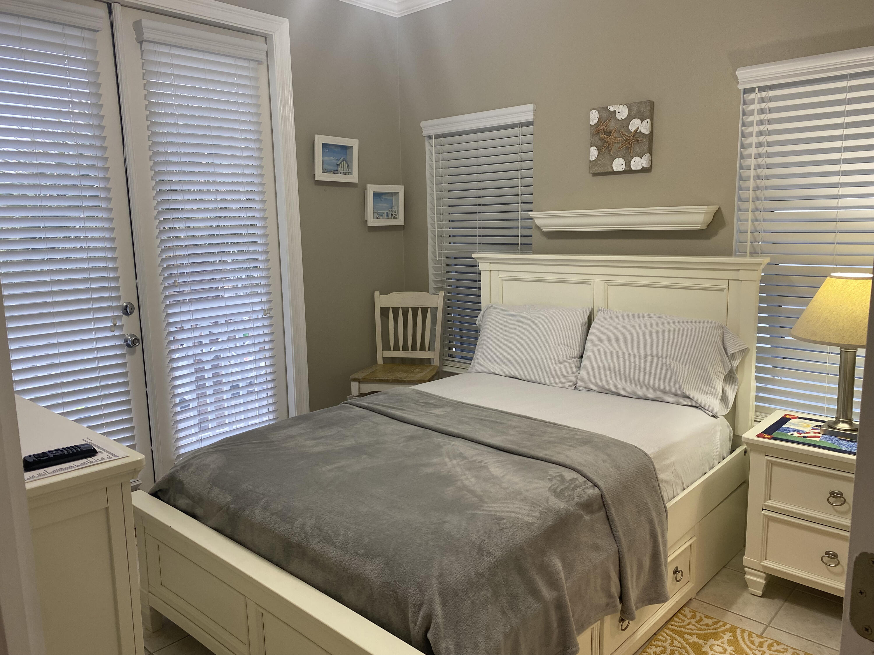 9 East Blue Crab Loop Inlet Beach, FL 32461 - Photo 40 of 55 a bedroom with a bed and a window