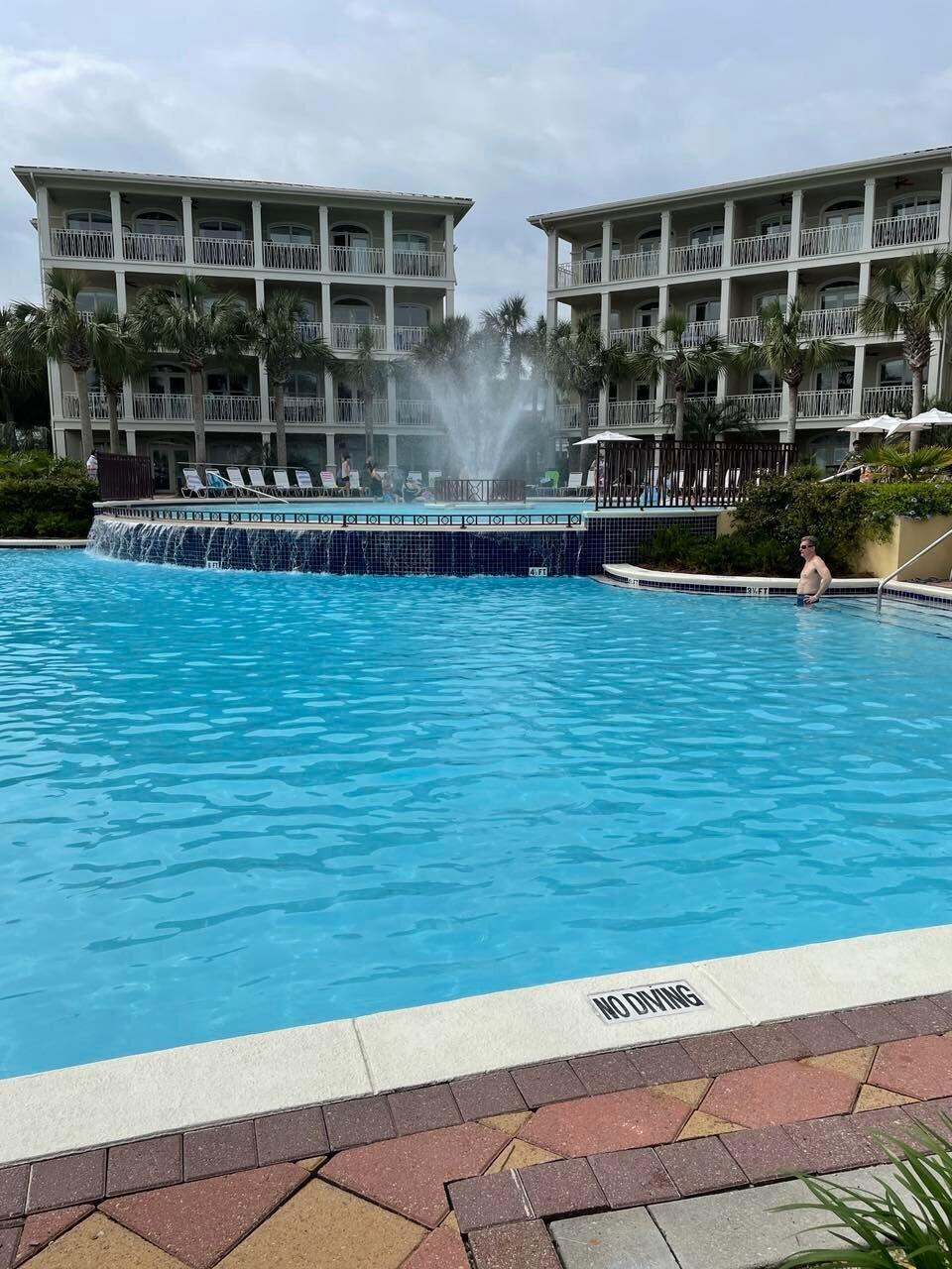 9 East Blue Crab Loop Inlet Beach, FL 32461 - Photo 48 of 55 a view of house with a swimming pool
