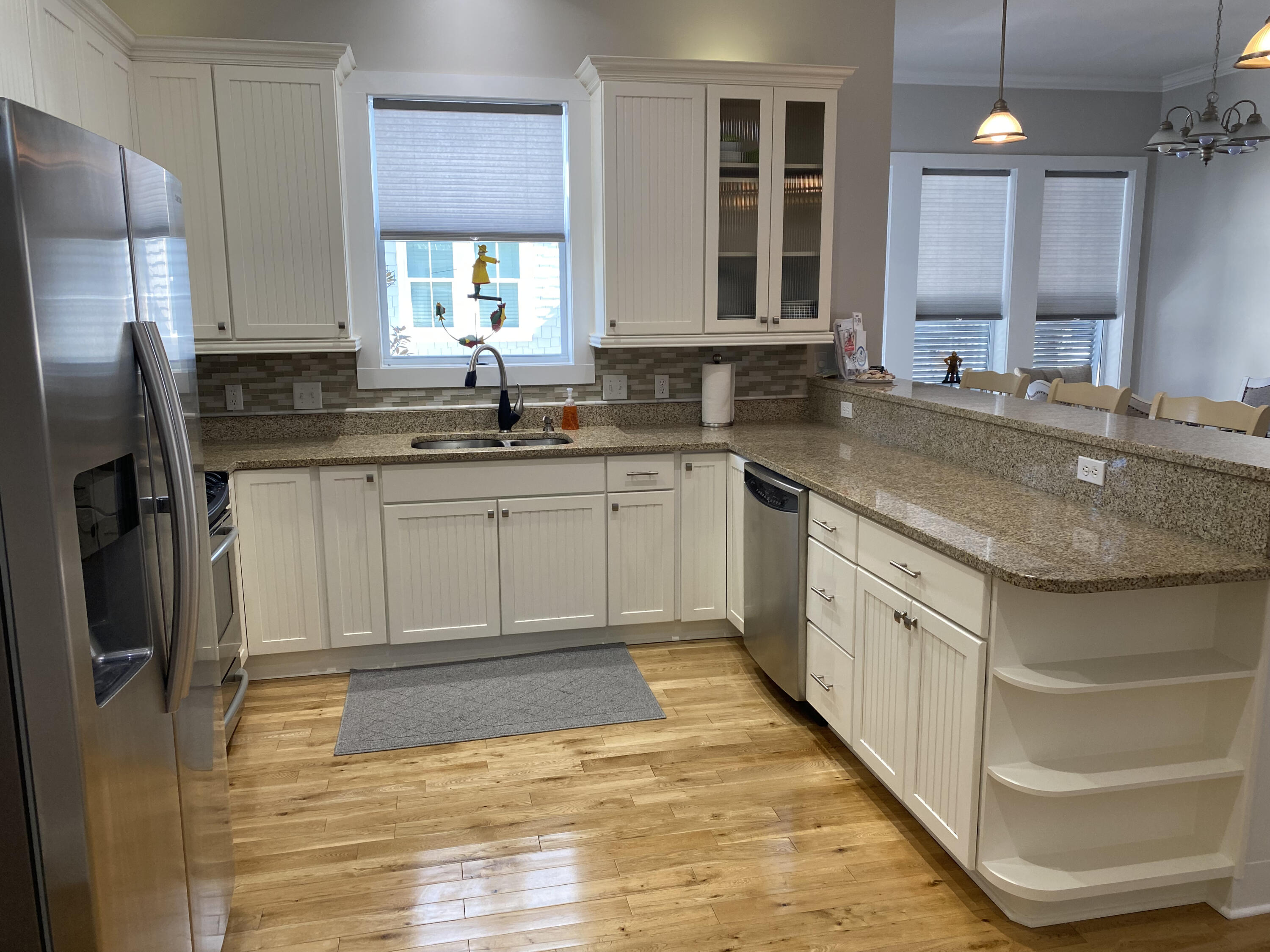 9 East Blue Crab Loop Inlet Beach, FL 32461 - Photo 8 of 55 a kitchen with stainless steel appliances granite countertop a sink stove and refrigerator