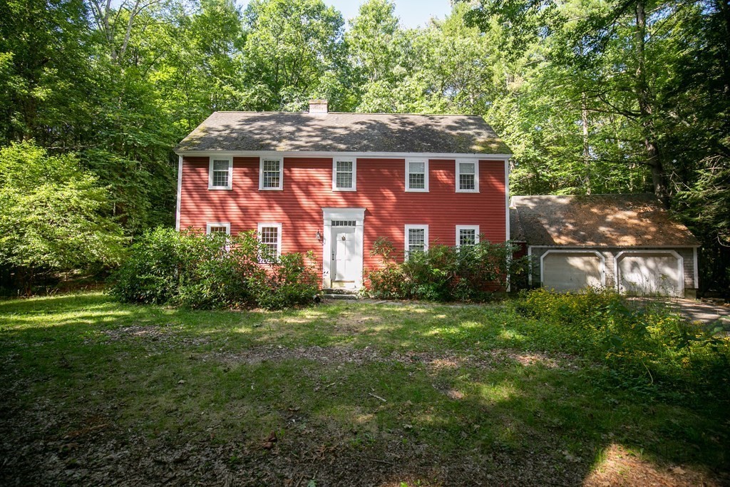35 Juggler Meadow Road Leverett, MA 01054 - Photo 1 of 40 a front view of a house with a garden