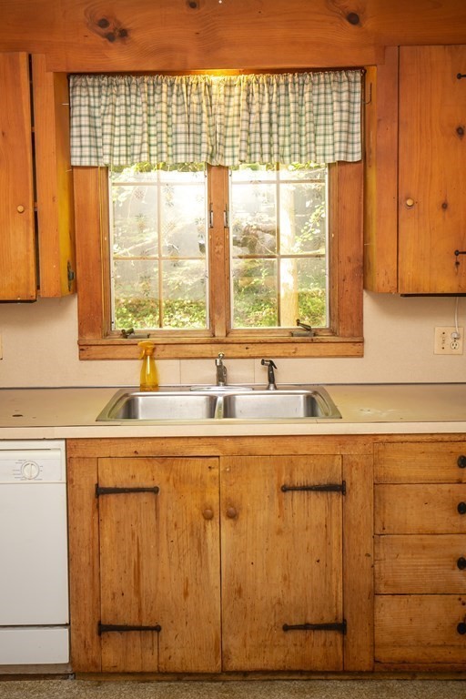 35 Juggler Meadow Road Leverett, MA 01054 - Photo 13 of 40 a kitchen with stainless steel appliances granite countertop a sink and a window