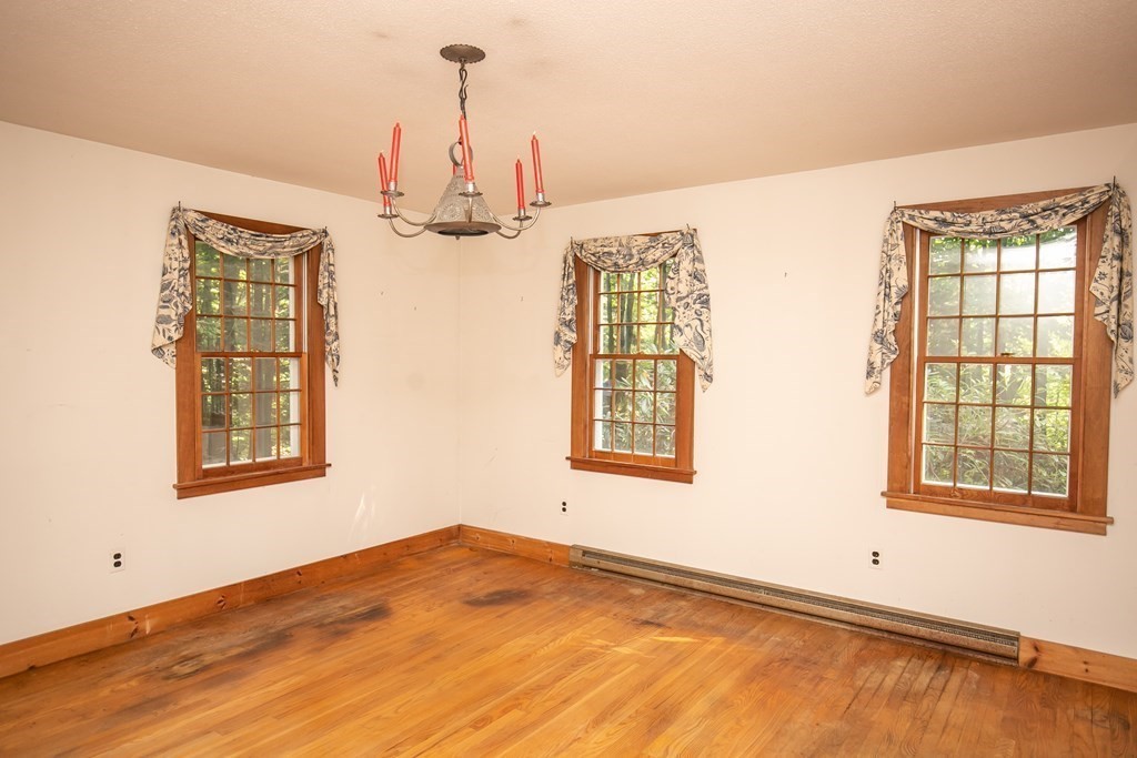 35 Juggler Meadow Road Leverett, MA 01054 - Photo 14 of 40 a view of an empty room with a window