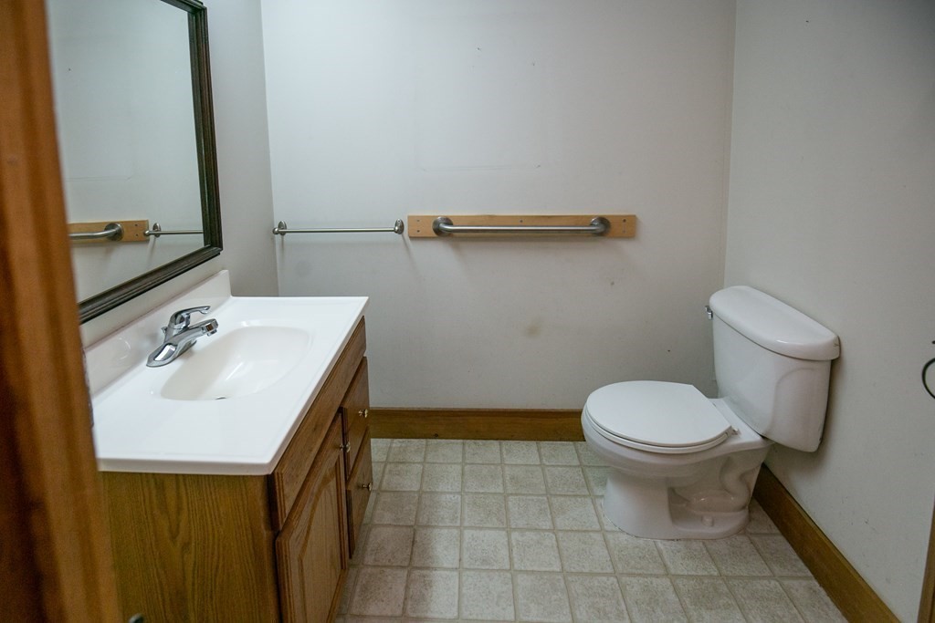35 Juggler Meadow Road Leverett, MA 01054 - Photo 19 of 40 a bathroom with a sink toilet and mirror
