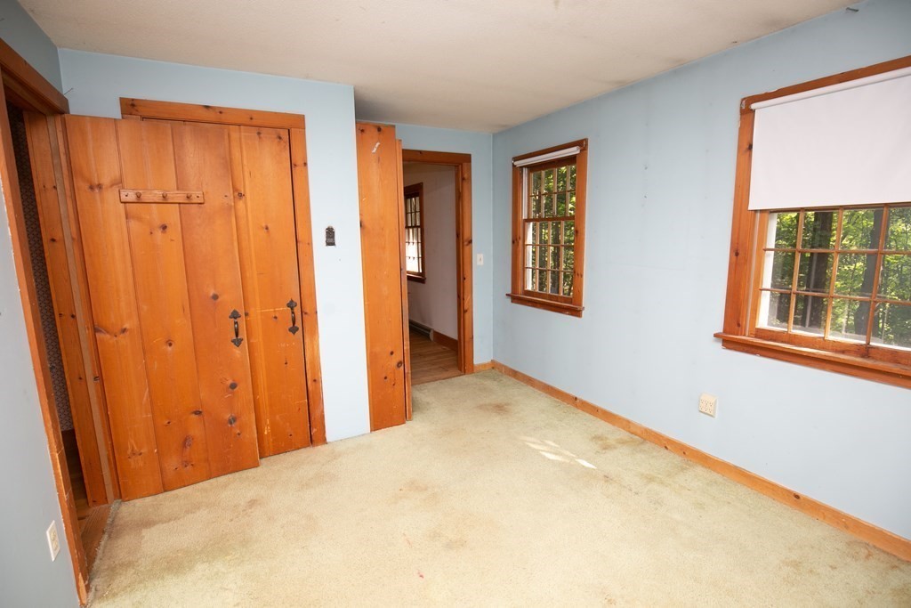35 Juggler Meadow Road Leverett, MA 01054 - Photo 27 of 40 a view of an empty room with window and bathroom