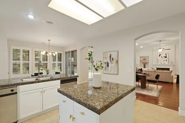 a bathroom with a sink and vanity
