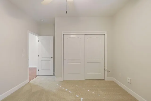 a white bath tub sitting next to a window
