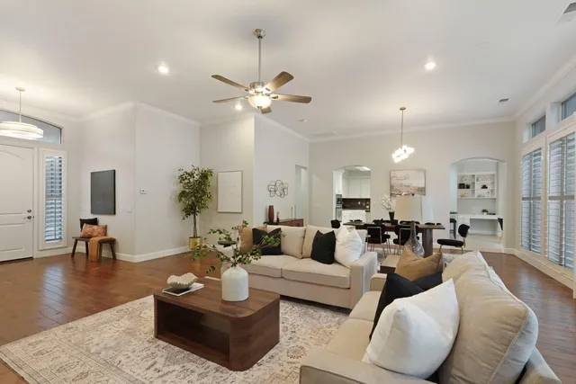 a view of a house with a yard and sitting area
