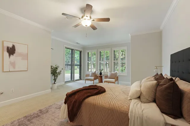 a view of backyard with swimming pool and sitting area