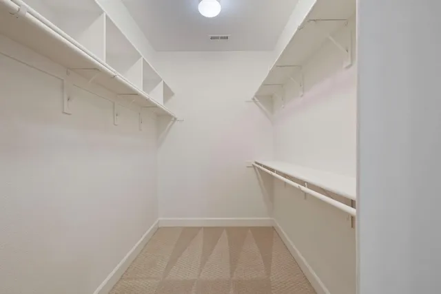 an aerial view of a house with outdoor space