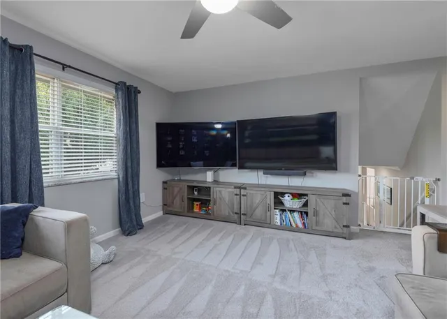 a spacious bedroom with a large bed and a window