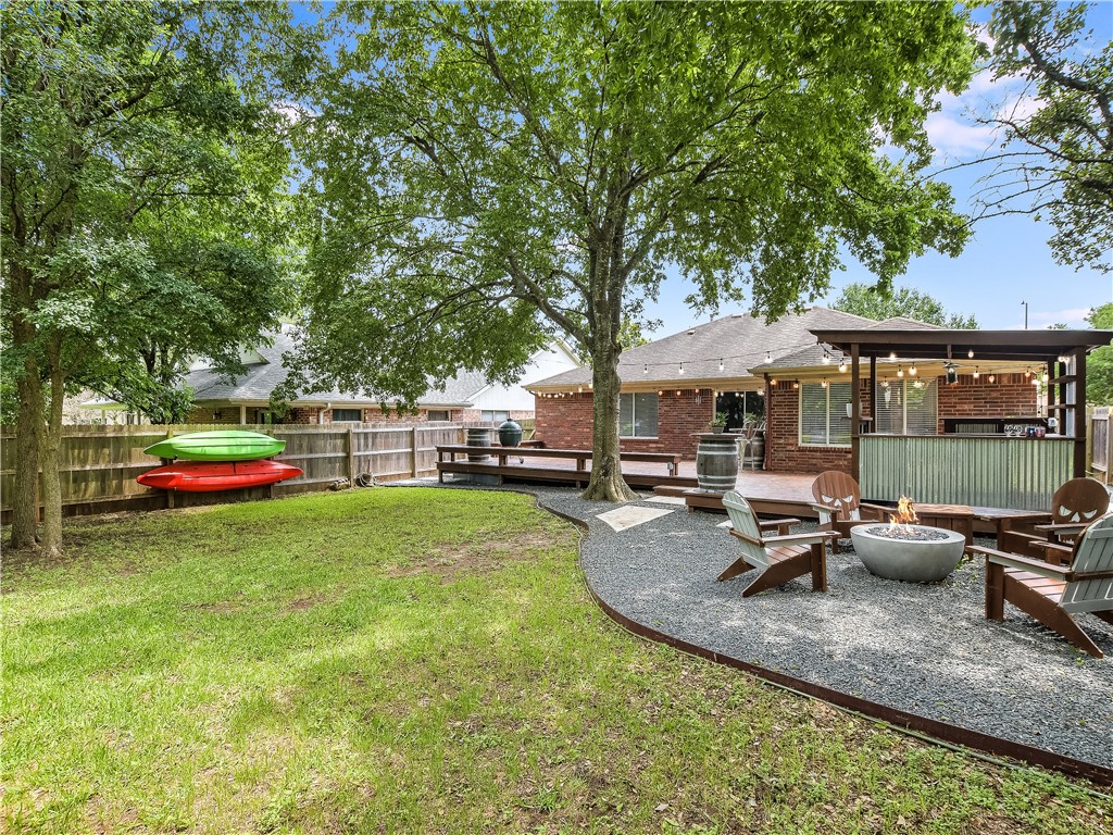 7164 Ridge Oak Road Austin, TX 78749 - Photo 1 of 1 a view of a house with backyard porch and sitting area