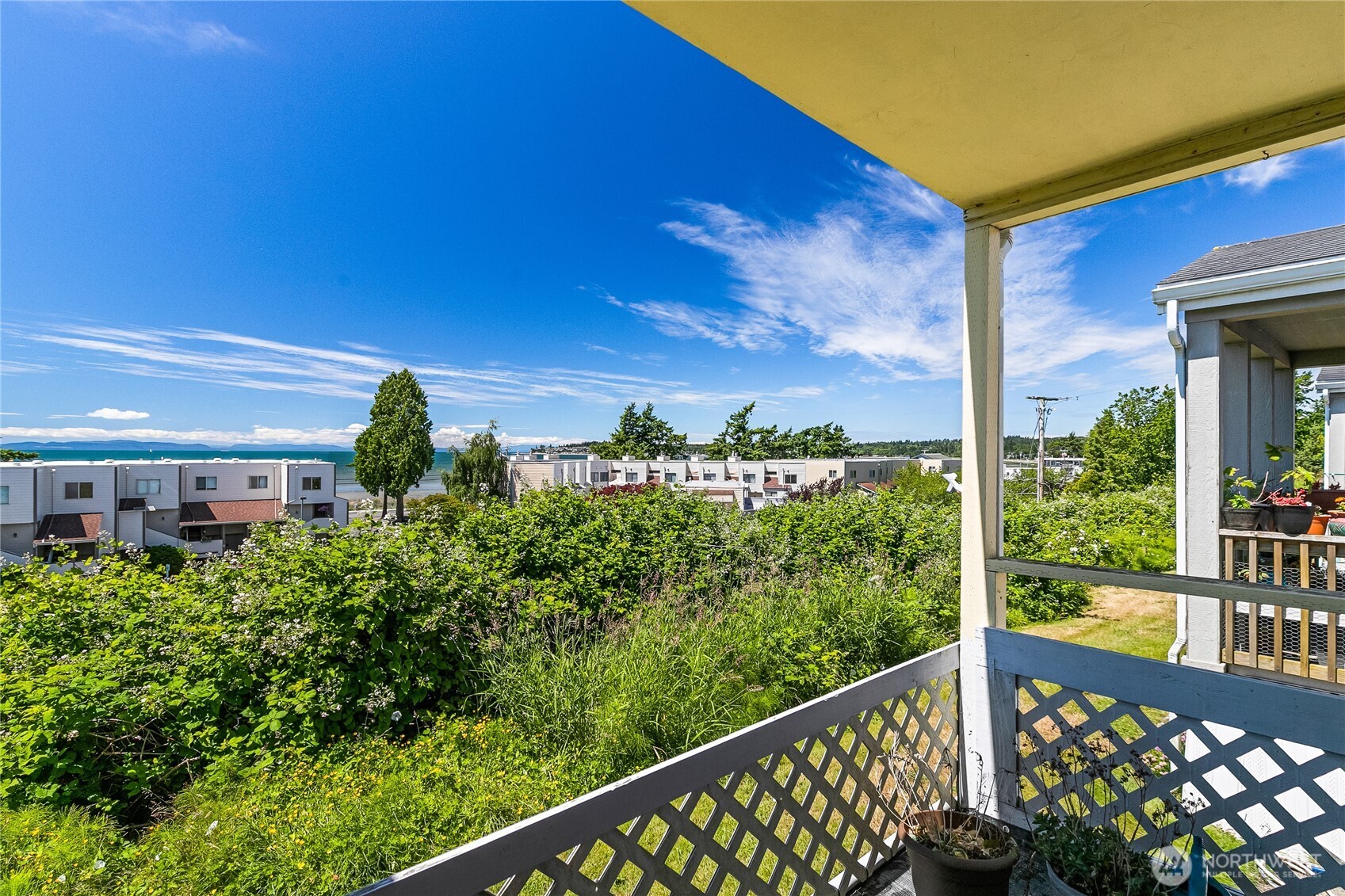 8080 Harborview Road, Unit 167 Blaine, WA 98230 - Photo 3 of 27 a view of a building from a balcony