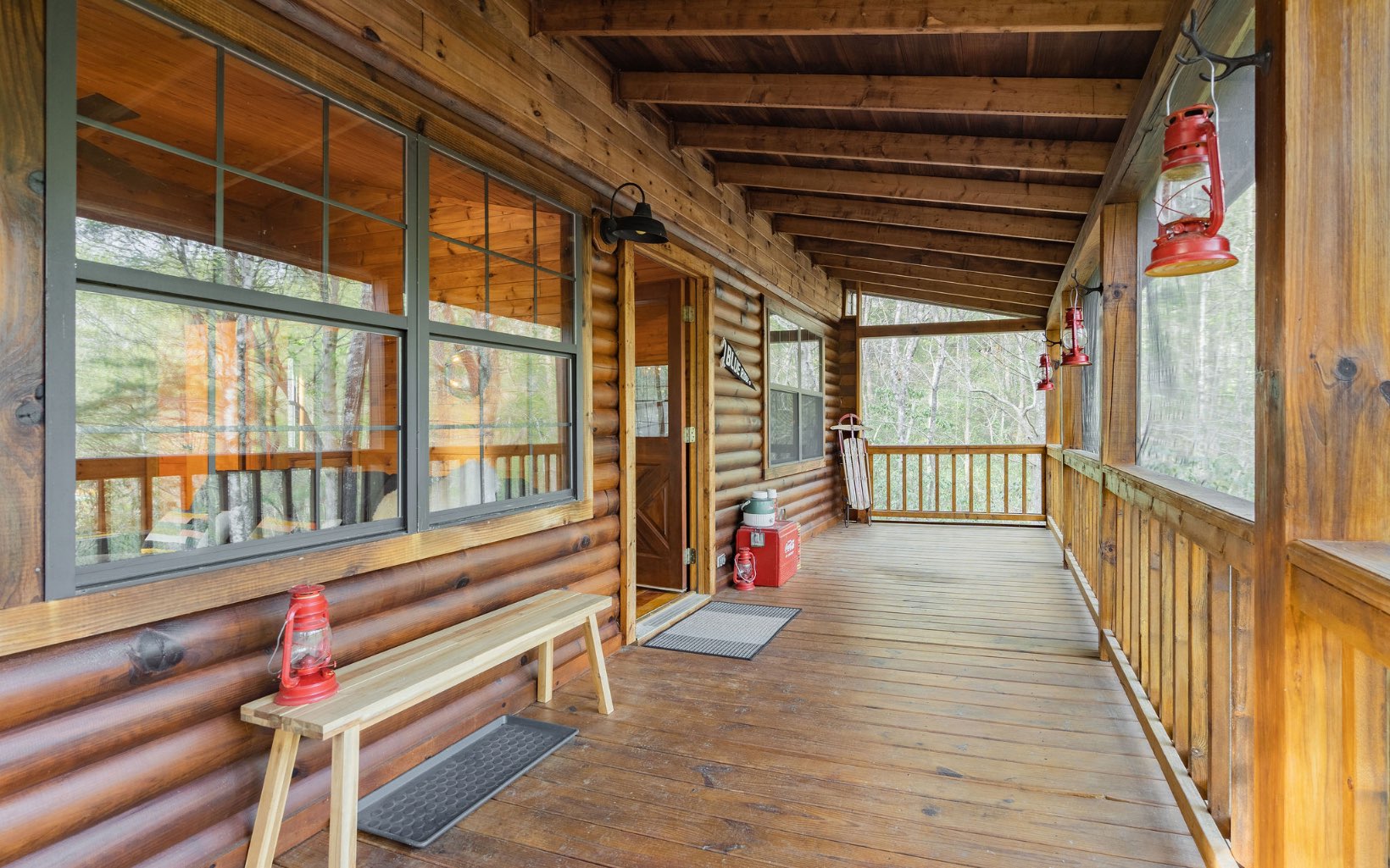 1311 Little Bushy Head Road Blue Ridge, GA 30513 - Photo 29 of 39 a view of porch with wooden floor and stairs