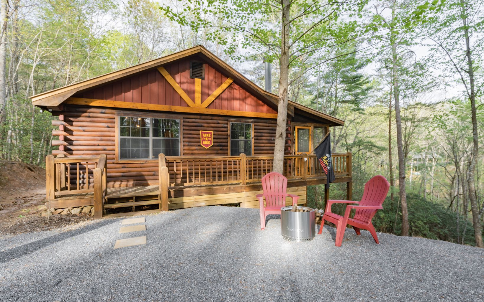 1311 Little Bushy Head Road Blue Ridge, GA 30513 - Photo 32 of 39 a view of backyard with deck and outdoor seating