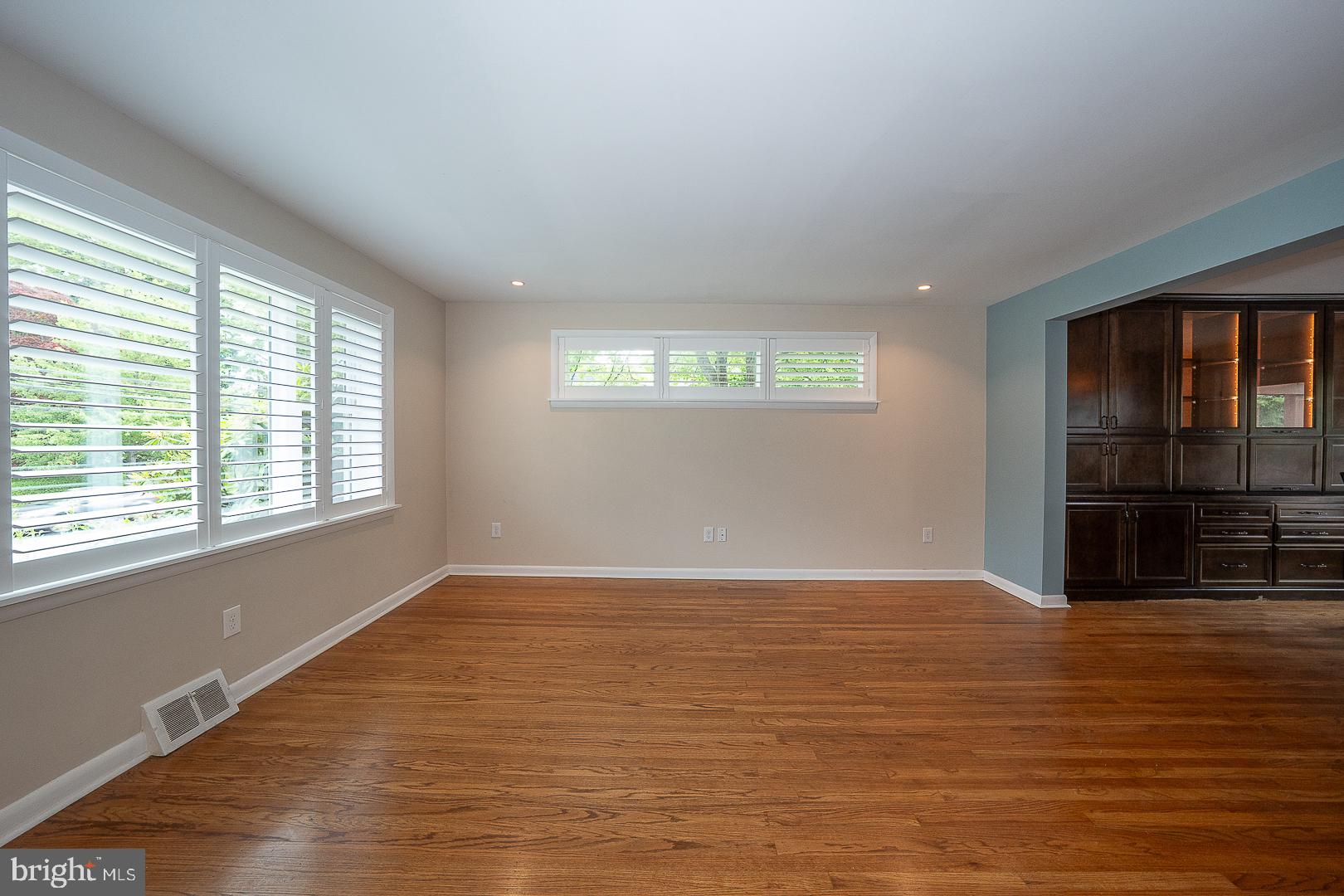 20 Fairview Road Swarthmore, PA 19081 - Photo 5 of 57 an empty room with wooden floor and windows