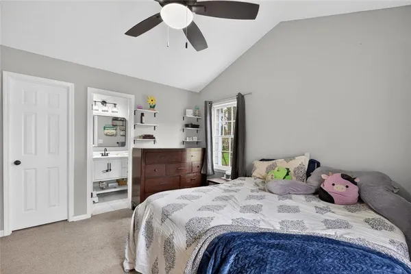 a bedroom with a bed and closet