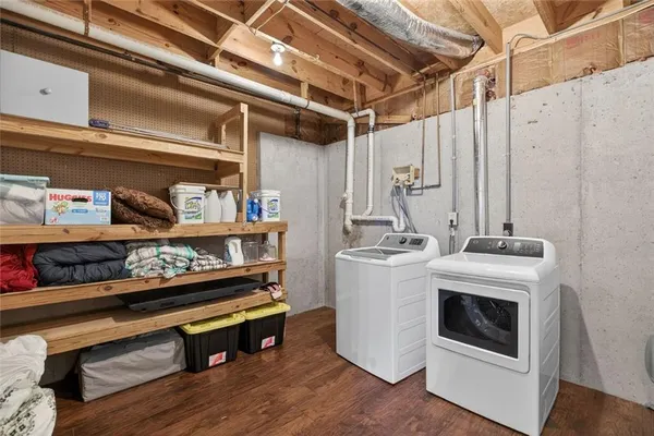 a utility room with washer and dryer